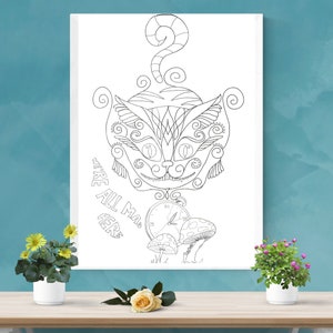 May include: Black and white line art print of the Cheshire Cat from Alice in Wonderland. The cat's face is highly detailed with swirling patterns. Text reads "WE'RE ALL MAD HERE" with a clock and mushrooms.