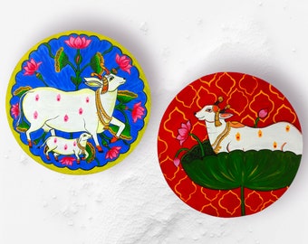Pichwai painting, Handpainted Pichwai cow, Pichwai cow set of two, Pichwai wall plates, Pichwai art|Pichwai plates|cow painting|Kamdhenu cow