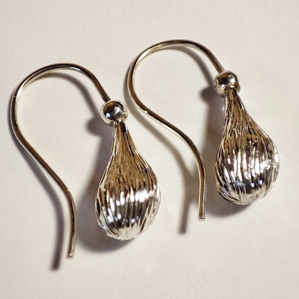 Water Droplet Earrings, made in Sterling Silver with Ear wires in a High Polish finish. Hand made in Scotland