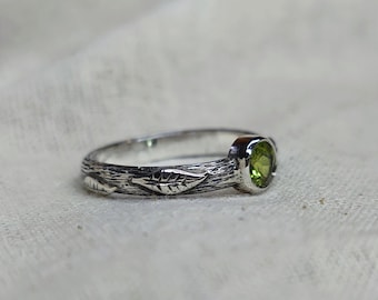 Peridot Leaf Ring with bark textured band, made with recycled sterling silver, handmade in Scotland