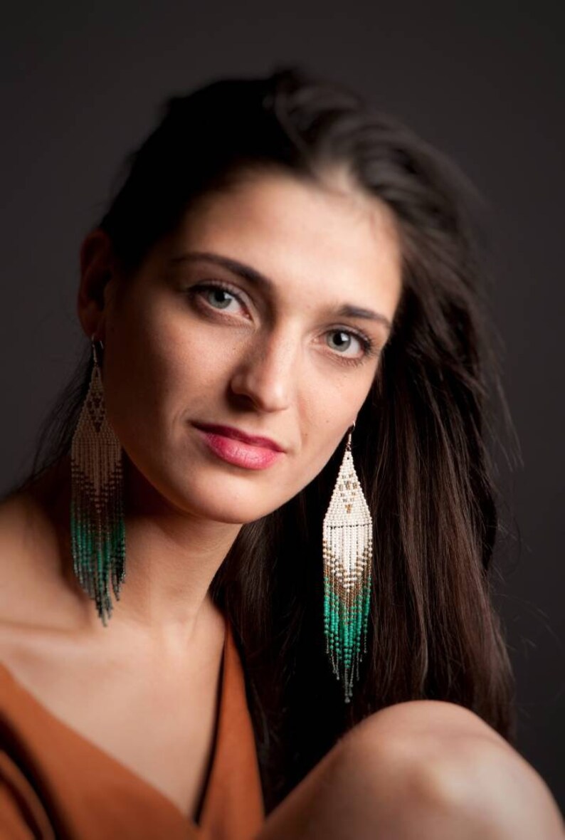 Extra long beaded earrings.