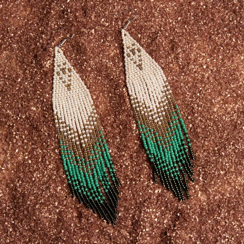 Extra long beaded earrings.