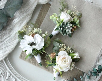 Boutonnières blanches, boutonnière verdure, boutonnière de poche, boutonnières vertes, mariage dans les bois, mariage verdure, boutonnière du marié