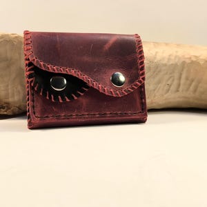 Billetera de piel con compartimentos para tarjetas, billetes y monedas