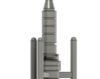 May include: A silver model of a rocket ship with a pointed top and a base with four legs.