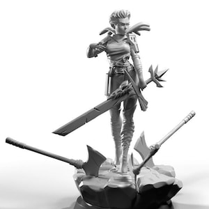 May include: A monochrome figurine of a female warrior, posed on a rocky base, wielding a sword and a staff. Two axes are positioned on the base. The figure is clad in armour and boots.