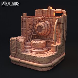 Op de afbeelding: Een gedetailleerd, bruinachtig miniatuurmodel van een put en de omringende structuur. Het model heeft een put, een ladder, een cirkelvormige opening en diverse architectonische details. Het Hardwitch Games-logo is zichtbaar linksboven.