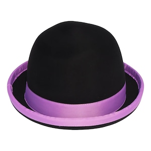 May include: A black bowler hat with a rounded crown and a wide brim. The hat features a lavender-colored ribbon band around the base of the crown and a lavender trim along the brim's edge. This classic hat is a stylish accessory.