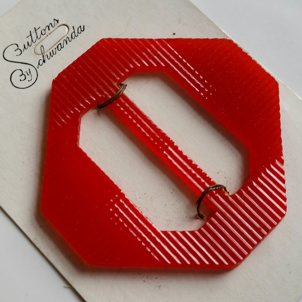 Bright red vintage 1940s casein plastic slide buckle on card - Buttons by Schwanda - octagonal - plastic - bakelite