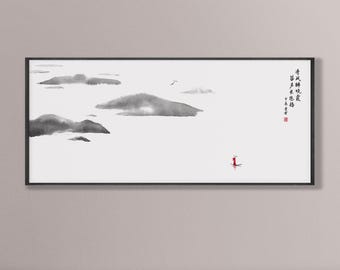 May include: A black framed art print with a minimalist ink wash painting of a landscape. The artwork shows mountains, clouds, and a small figure in a boat, with Chinese calligraphy on the right side.