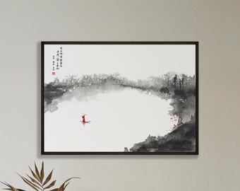 May include: A framed ink wash painting featuring a small boat with a figure in a red garment on a calm body of water. The scene includes black and grey brushwork depicting distant trees and a rocky shoreline with red floral accents and calligraphy.