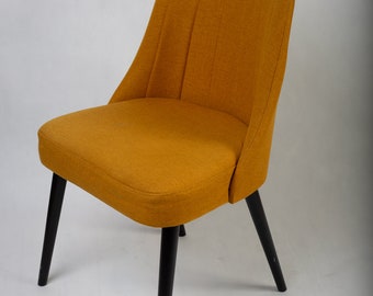 Retro upholstered chair K84 on wooden legs