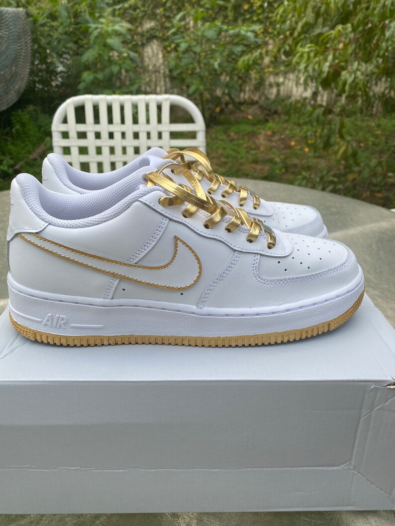 nike air force 1 gold