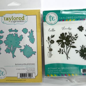 May include: Two craft sets: one with teal floral die cuts and the other with black floral rubber stamps. The die cut set is in a yellow package with the text "Botanical Brushstrokes." The stamp set is in a clear package with the text "Botanical Brushstrokes."