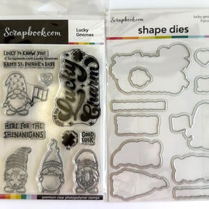 May include: A set of Scrapbook.com Lucky Gnomes clear photopolymer stamps and matching metal shape dies. The stamps feature three gnomes, shamrocks, hearts, and text including Lucky to know you, Happy St. Patrick's Day, and Lucky Charm.