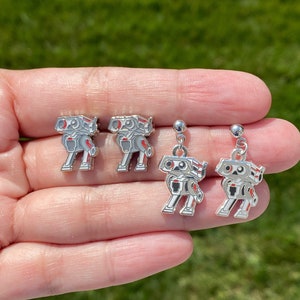 BD , (Pair) Stud Earrings, hard enamel silver plating