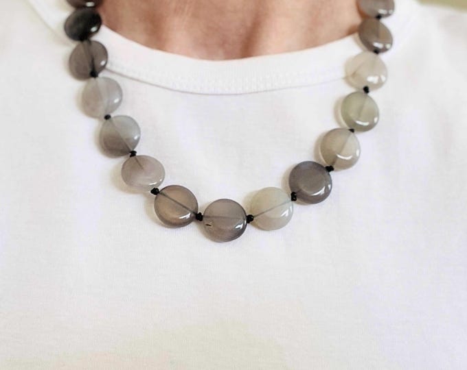Cord necklace with silver grey agate discs