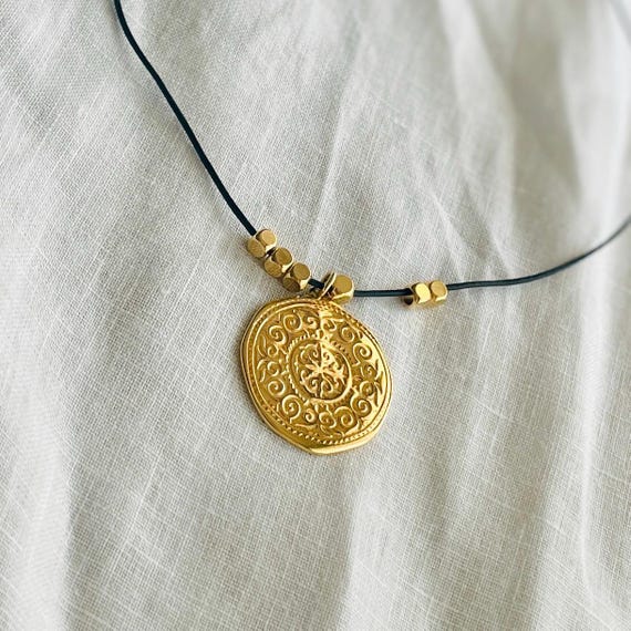 Adjustable cord charm necklace with medallion pendant, gold or silver