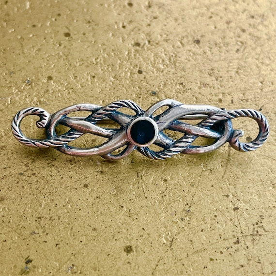 Silver and jet vintage pin