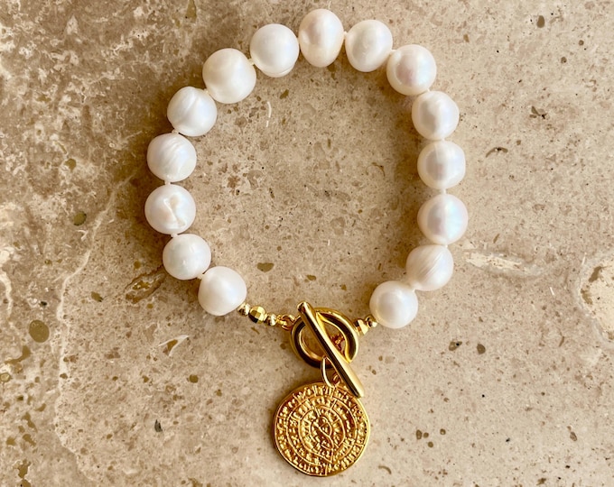 Statement pearl bracelet with gold coin charm