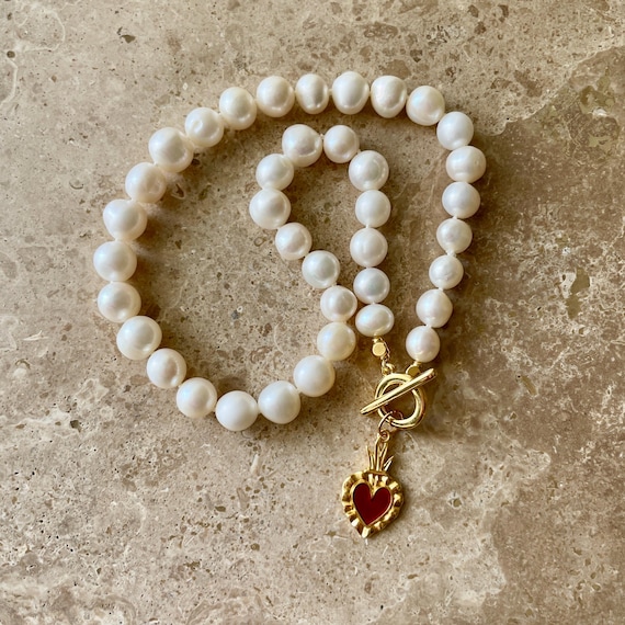 Pearl toggle necklace with sacred heart pendant