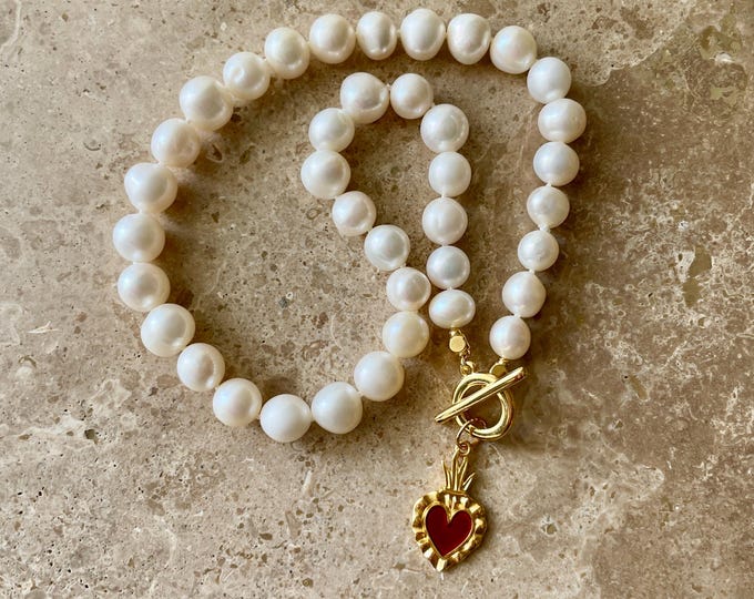 Pearl toggle necklace with sacred heart pendant