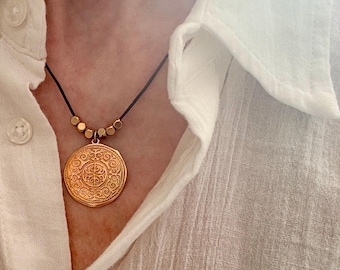 Adjustable cord charm necklace with medallion pendant, gold or silver