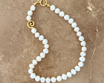 Pearl T bar necklace with gold spiral detail