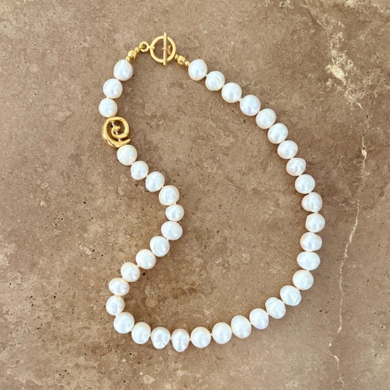 Pearl T bar necklace with gold spiral detail