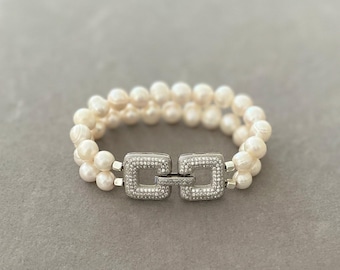 Double strand pearl bracelet with statement clasp