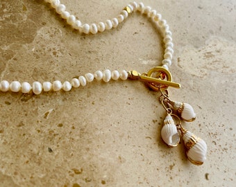 Pearls and seashells charm necklace