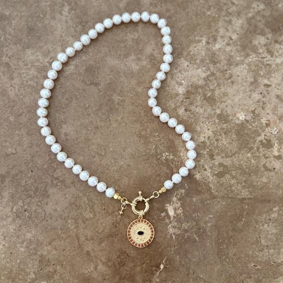 Convertible freshwater pearl necklace with Greek eye pendant and mini cross charm