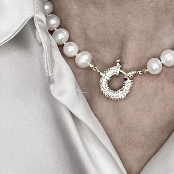 Statement pearl necklace with chunky pave clasp