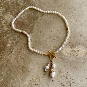 Seashells and pearls charm necklace