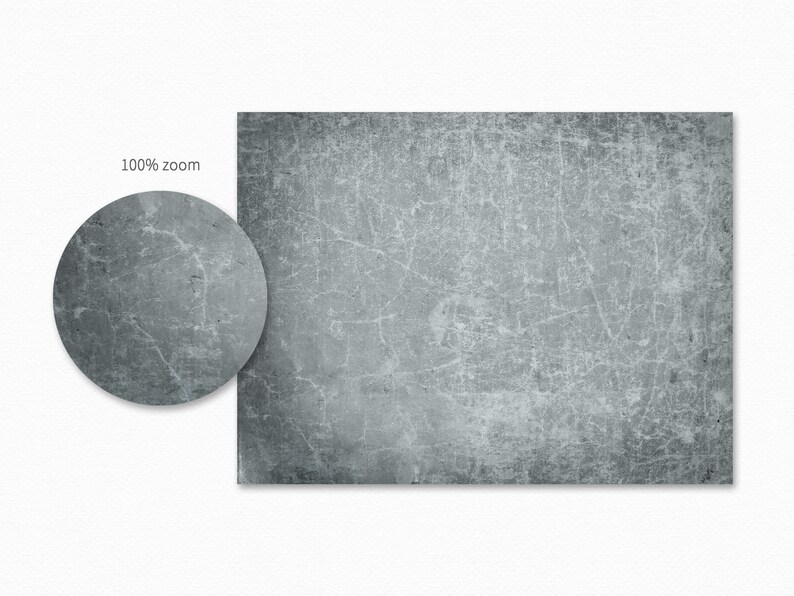 May include: A close-up of a gray, textured surface with a subtle blue tint. The surface has a distressed look with fine cracks and lines.
