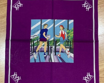 May include: Purple bandana with a white border and the text "UNITED SPORTS CLUB XAX" in the corners. The center of the bandana features a colorful illustration of two people running on treadmills.