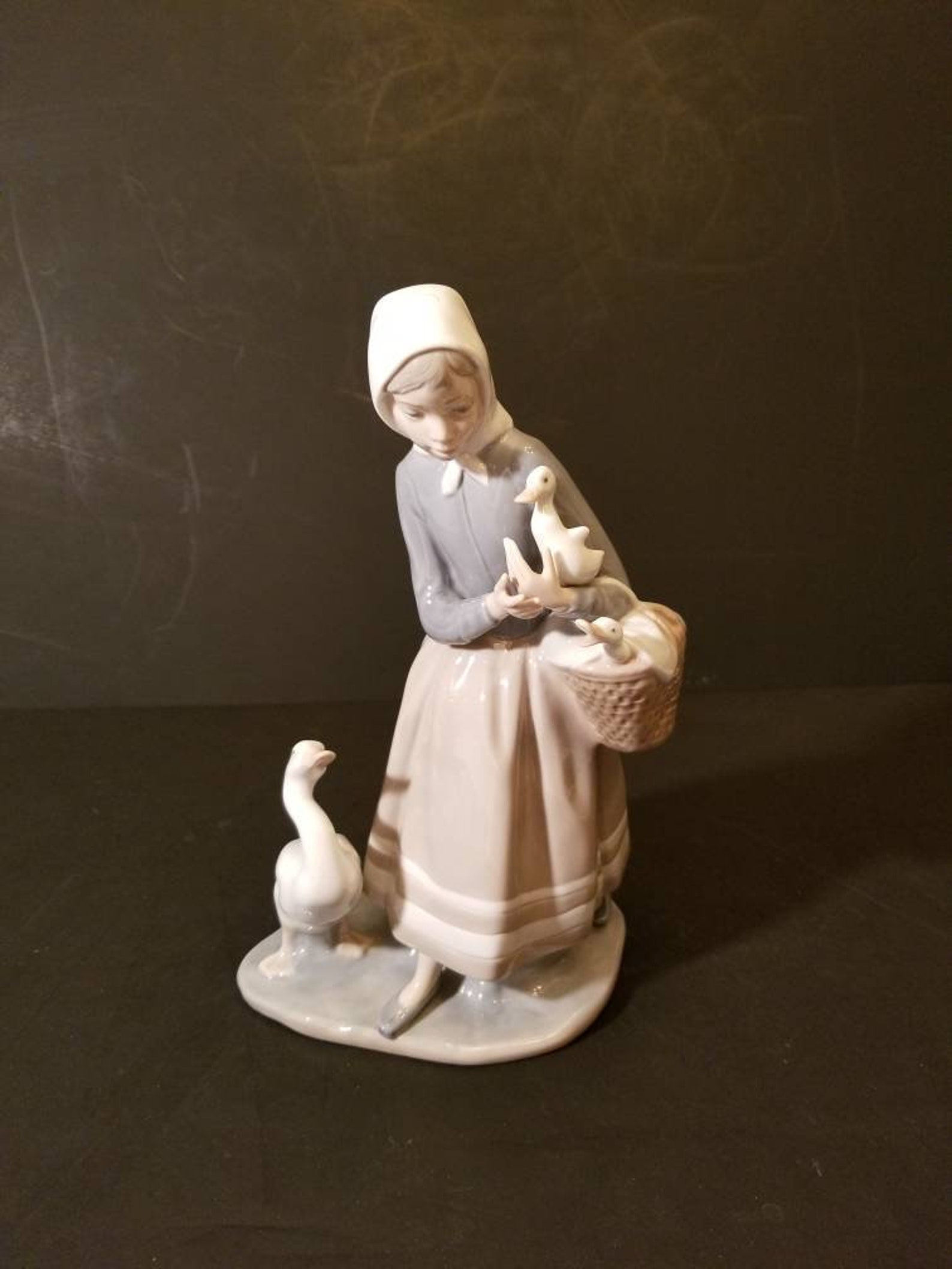 lladro shepherdess with ducks