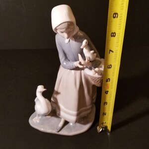 lladro shepherdess with ducks