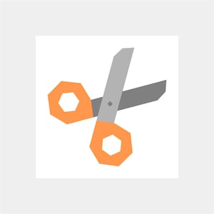 May include: A pair of orange and grey scissors with a simple design. The scissors are open and ready to cut.