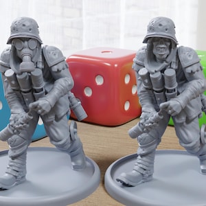 May include: Two gray figurines of a soldier in a gas mask and helmet, carrying multiple canisters. The figures are on round bases, with colorful dice in the background. The soldier is in a running pose.