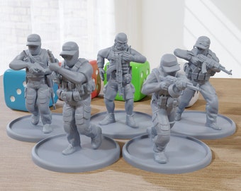 May include: Five gray plastic figurines of soldiers wearing tactical gear and holding rifles. The figures are standing on round bases.