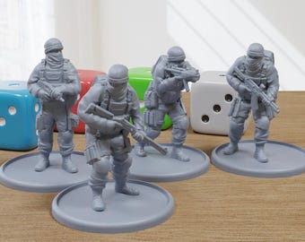 May include: Five gray plastic miniature figures of soldiers holding rifles, standing on round bases. The figures are wearing helmets and tactical gear. The figures are arranged in a semi-circle on a wooden surface.