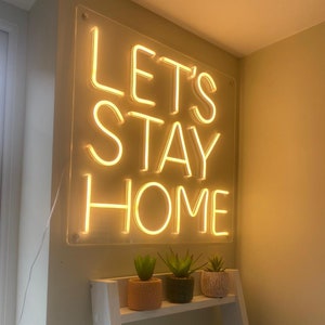 Hanging neon signs top
