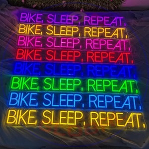 Custom Neon Sign: BIKE. SLEEP. REPEAT. Pink Bedroom Decor