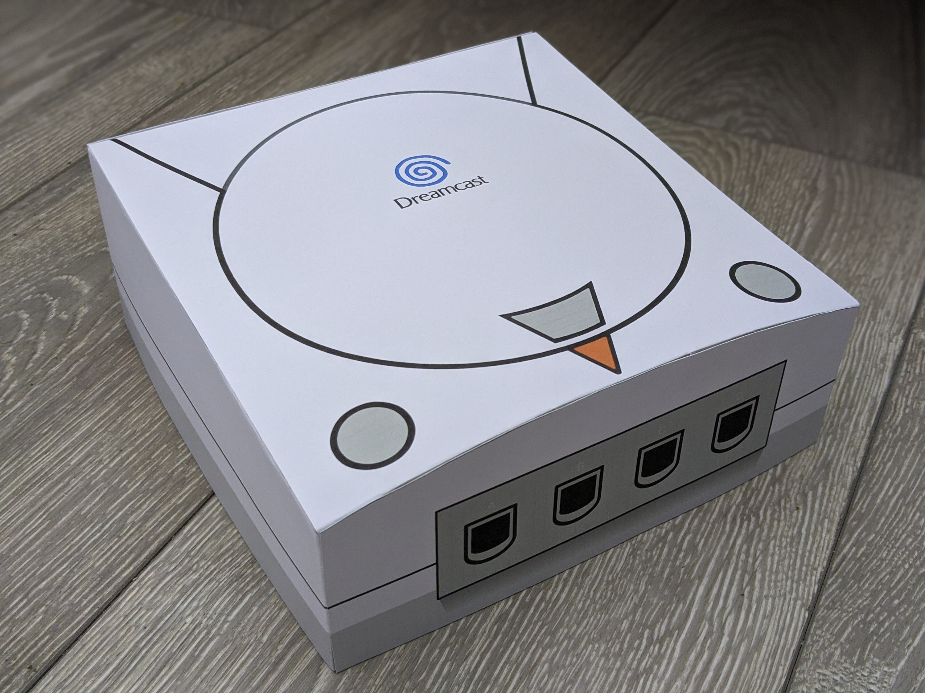 Papercraft Sega Dreamcast dust cover and light protector (Blue Logo PAL Version)