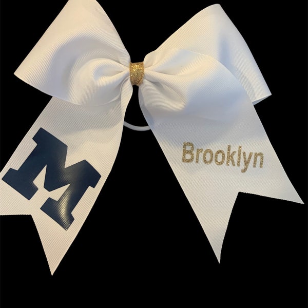 Custom grosgrain ribbon cheer bow with team logo and cheerleaders name