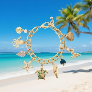 Pulsera dorada con dijes de vida marina