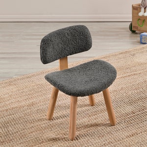 Cozy kids Sherpa chair, perfect for snuggles and relaxation. Plush, soft, and inviting, a comfy addition to any child's room or play area.