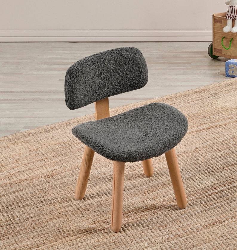 Cozy kids Sherpa chair, perfect for snuggles and relaxation. Plush, soft, and inviting, a comfy addition to any child's room or play area.