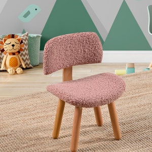 Cozy kids Sherpa chair, perfect for snuggles and relaxation. Plush, soft, and inviting, a comfy addition to any child's room or play area.